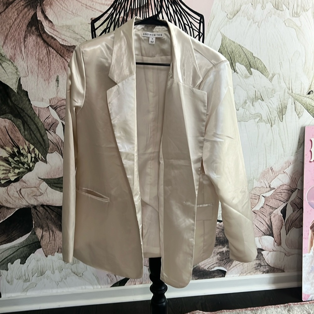 Oversized cream shiny blazer! I’ve worn for work and concerts.